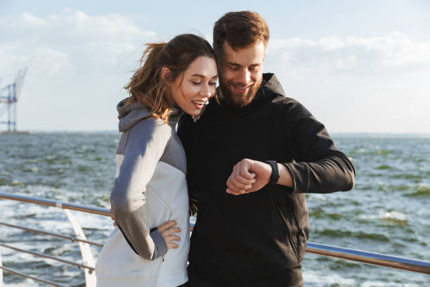 istock Happy young sports couple talking 1324223437