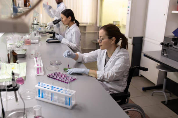 istock Middle aged female scientist working with blood tests 1324230831