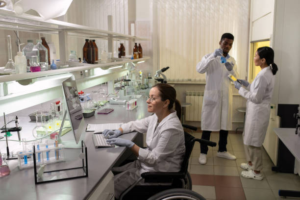 istock Group of intercultural scientists working in laboratory 1324230951