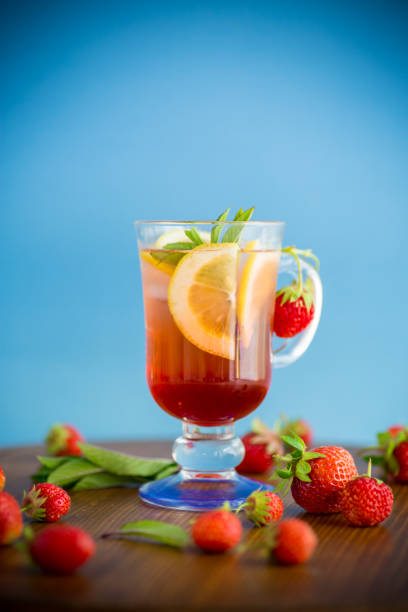 istock refreshing cool strawberry lemonade with lemon, ice and mint in a glass 1324231606