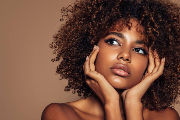 istock Beautiful girl with curly hairstyle 1324234886