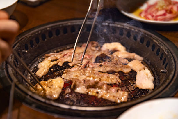 istock Delicious meat grilled over charcoal 1324236346
