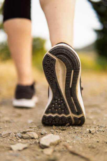 istock Vertical close-up view of a runner's shoe 1324236660
