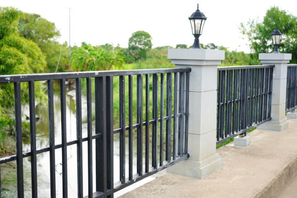 istock Beautiful decorative iron wrought fence and lamp 1324238993