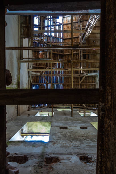istock The interior of an old, ruined grain mill. 1324242350