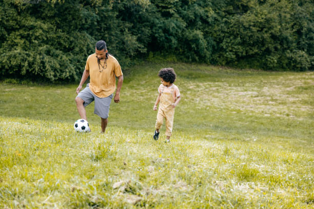 istock Soccer fun with dad in the summer 1324246477