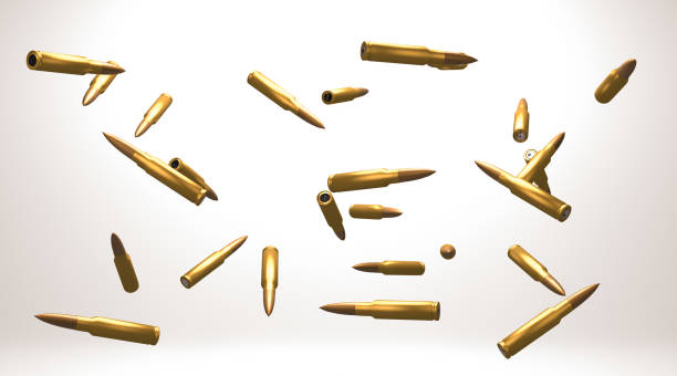 istock Close up military bullets falling in the air 1324249383
