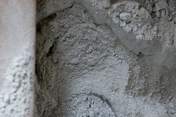 istock dry powder gray mortar in a paper bag 1324250470