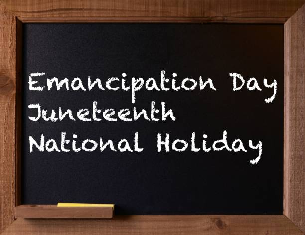 Photo of a small Chalkboard with a message written on the board.  The message is for National Holiday Juneteenth. Photo of a small Chalkboard with a message written on the board.  The message is for National Holiday Juneteenth. emancipation proclamation stock pictures, royalty-free photos & images