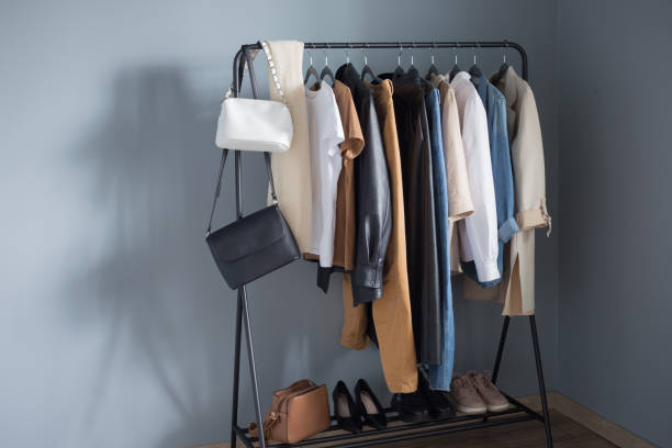 istock basic women's autumn wardrobe with shoes and handbags on  hanger 1324252942