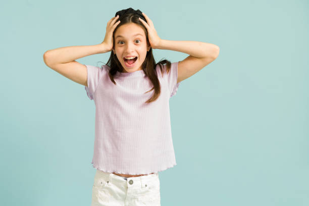 istock Young girl smiling and feeling very excited 1324253163