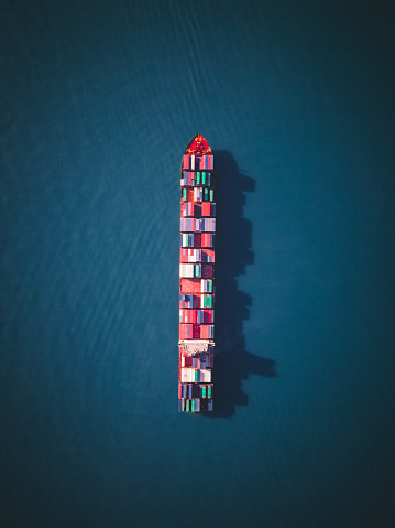 Cargo ship filled with containers in different colors