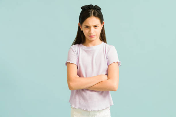 istock Moody preteen with a temper and folded arms 1324255135