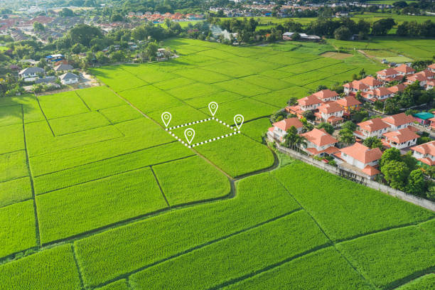 Land plot in aerial view. Land or landscape of green field in aerial view. Include agriculture farm, house building in village. That real estate or property. Plot of land for housing subdivision, development, owned, sale, rent, buy or investment in Chiang Mai of Thailand. conspiracy stock pictures, royalty-free photos & images