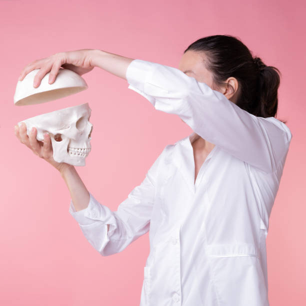 istock A psychotherapist opens the skull to get to the source of psychological problems, concept. 1324258262