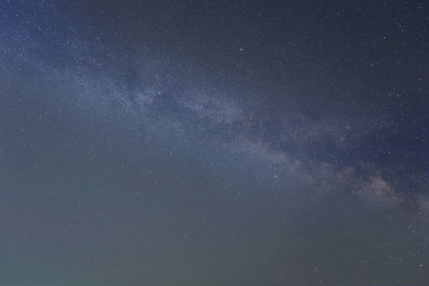 istock night starry sky wint milky way, natural astronomy science background 1324259503