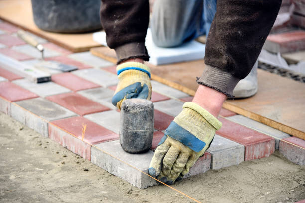 istock Builder laying of paving slabs on sand 1324260202