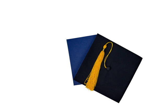 istock Graduation cap and diploma isolated on white background. Graduation concept. Black Mortar Board Cap, top view 1324262240