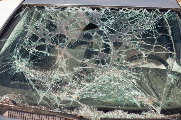 istock Broken car glass. The windshield cracked. Damaged transport. 1324265912