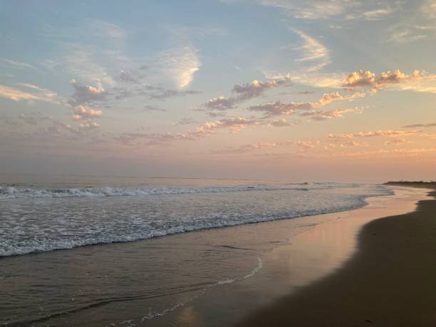 istock Soft pink sunset at the beach 1324272572