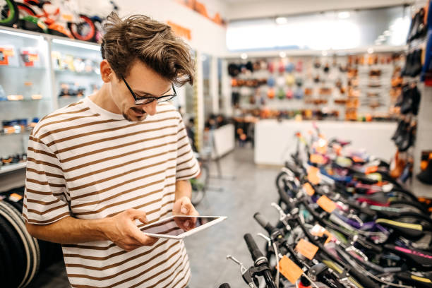 istock Man who works in a bicycle shop 1324279774