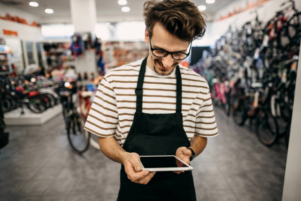 istock Smiling bike mechanic 1324280701