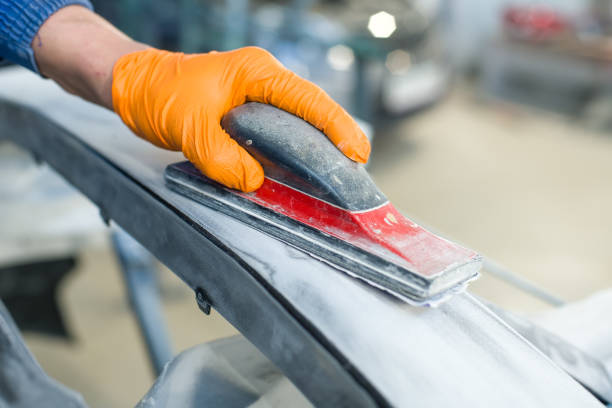 istock preparation for painting a car bumper 1324281591