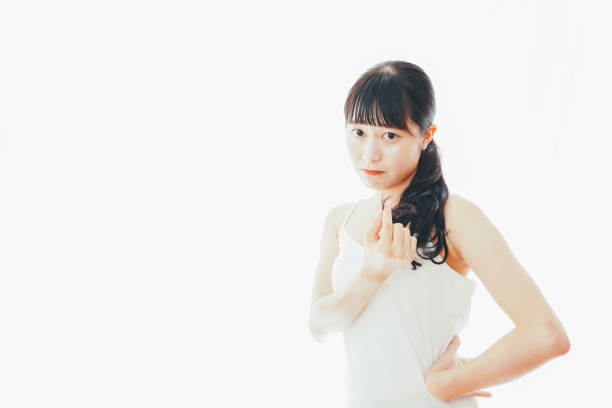 istock Young woman worrying about hair damage 1324282543