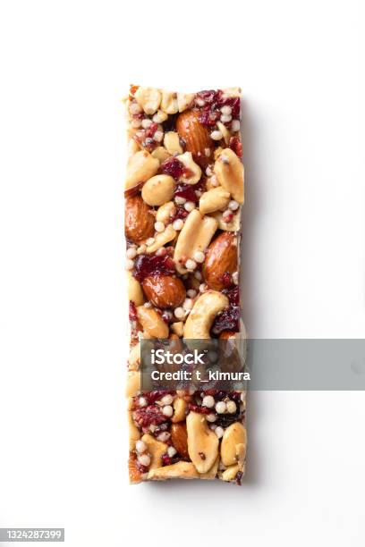 Fruit And Nut Bar Granola Bar Stock Photo - Download Image Now - Protein Bar, Cut Out, Vertical