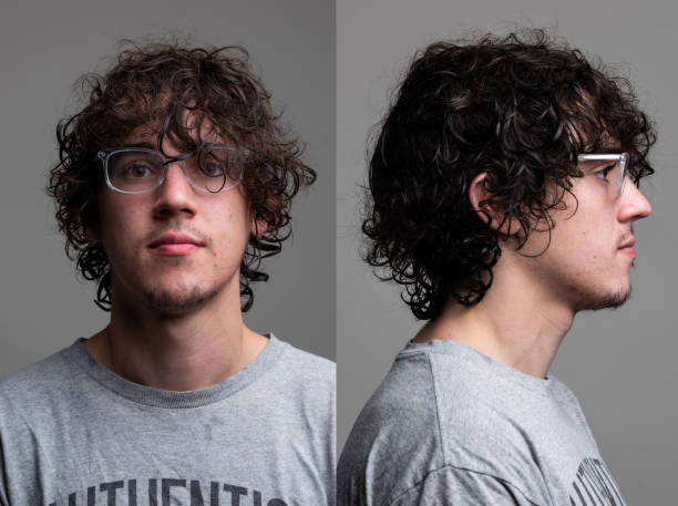 istock Serious young man front and profile mugshots 1324294823