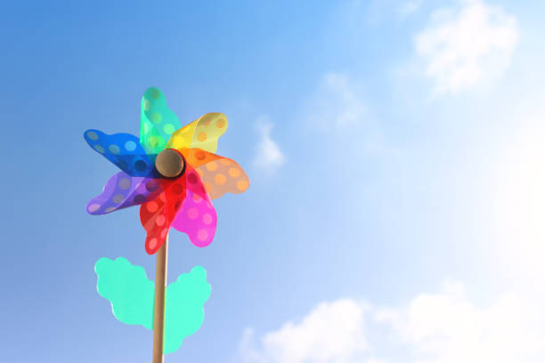 istock Image of Colorful pinwheel against blue sky 1324299211
