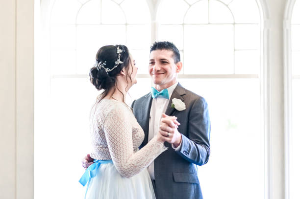 istock Bride and groom on the dance floor at their wedding reception 1324299389
