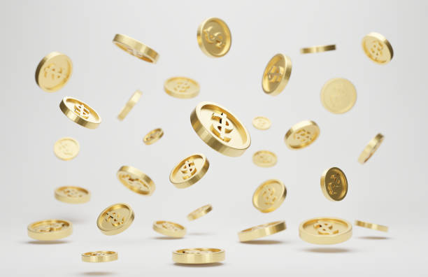 istock Gold coins with dollar sign falling or flying isolated on white background 1324308480