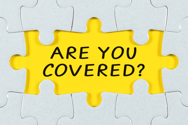 istock Are You Covered question on a Jigsaw Puzzle - business concept 1324310147