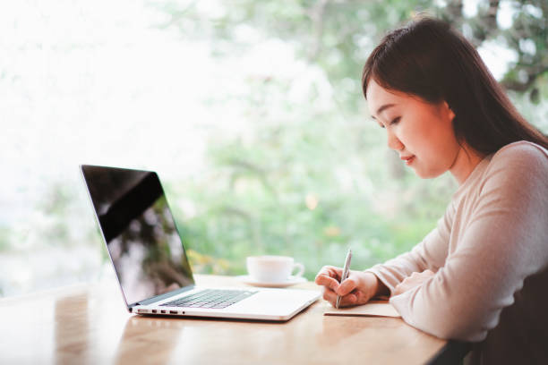 istock Asian woman working in the co-working space. 1324310149