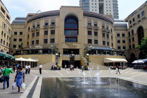 Nelson Mandera memorial Square in Johannesburg. People take a rest and relaxing in the square.