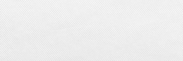 istock White fabric cloth polyester texture and textile background. Wide banner. 1324316461