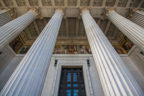 columns and entrance of a greek temple recreation - austrian parliament imagens e fotografias de stock