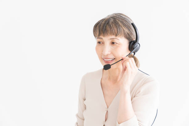 istock senior age woman who works as an operator 1324327111