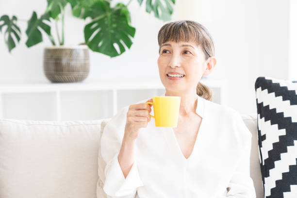 istock senior age woman who drink coffee 1324327138
