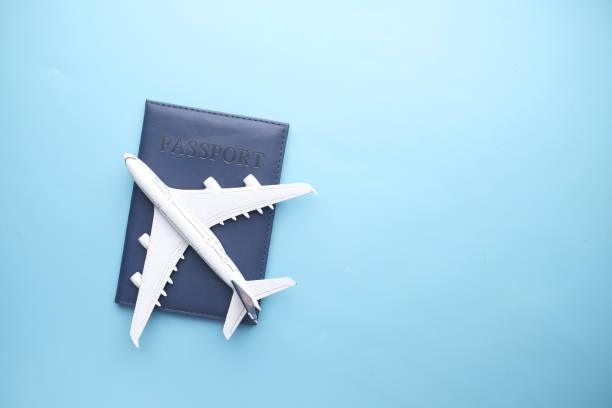 istock top view of passport and plate on table with copy space 1324327177