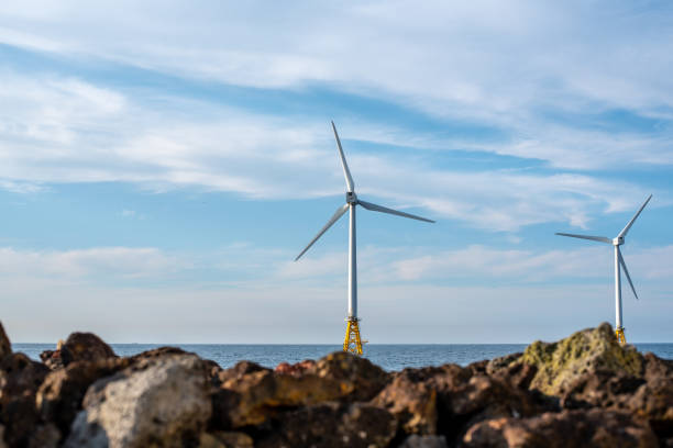 istock Wind generator turbine built on the sea 1324330247