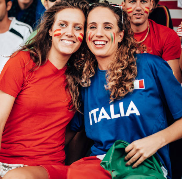 istock italian and spanish supporter at the stadium 1324339018