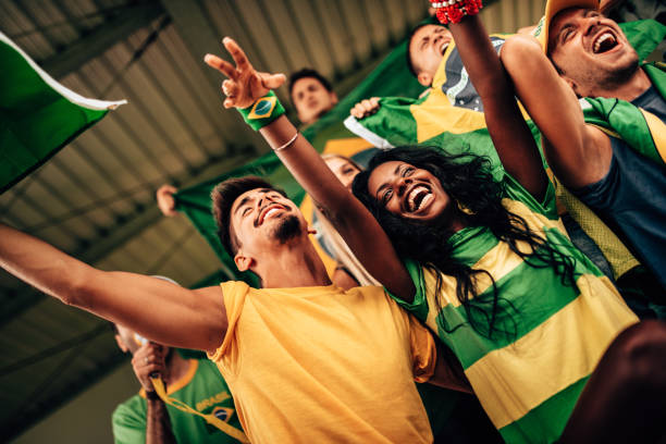 istock brazilian supporters have fun at the stadium 1324339122