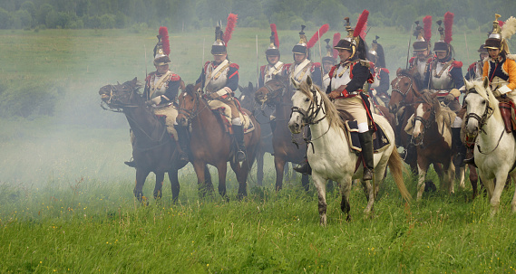 Participants of the military historical reconstruction of the events of the Napoleonic Wars on the Borodino field in the Moscow region during the holiday \
