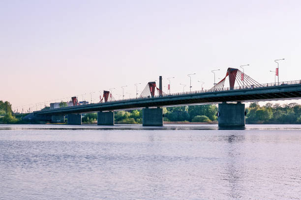 istock Urban landscape with bridge above the river 1324350526