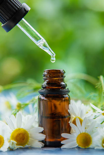 istock Essential oil extract of medicinal chamomile. Selective focus. 1324352948