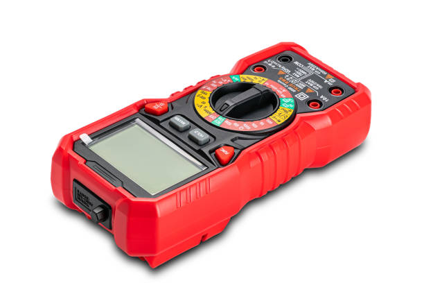 istock High angle view of red portable digital multimeters or multitester isolated on white background. 1324356375