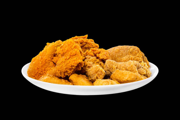 chicken fried and nugget snack isolated on black with cliping path chicken fried and nugget snack isolated on black with cliping path nuggets heat stock pictures, royalty-free photos & images