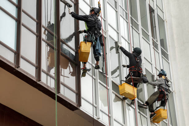 istock Industrial mountaineering workers hangs over residential facade building 1324364005